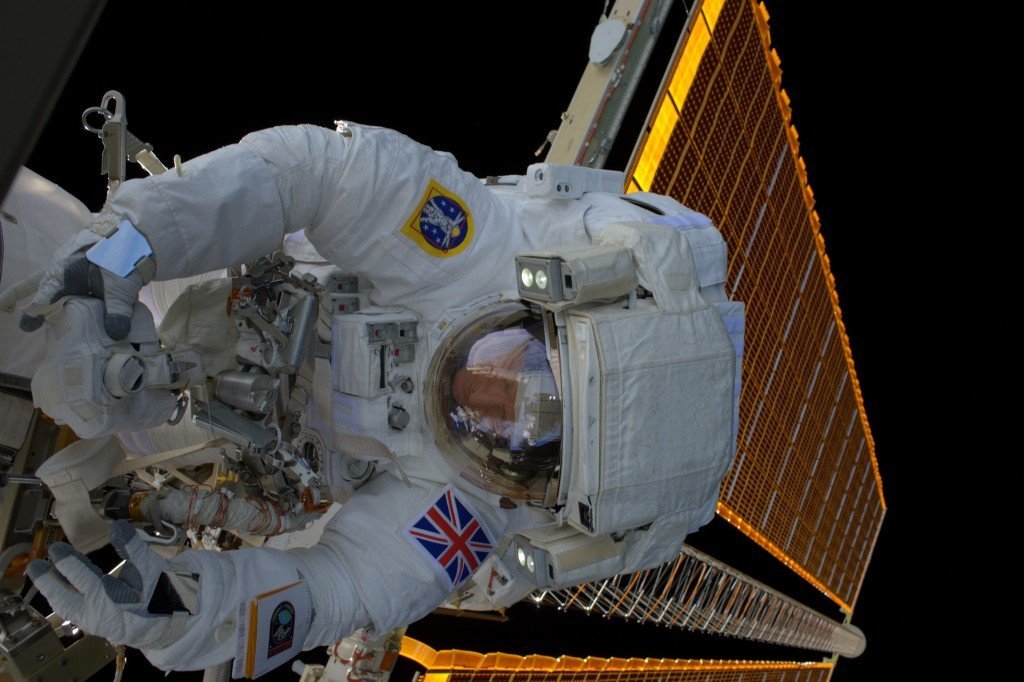 Tim steps outside the ISS, is disappointed by lack of fresh air | Image: ESA